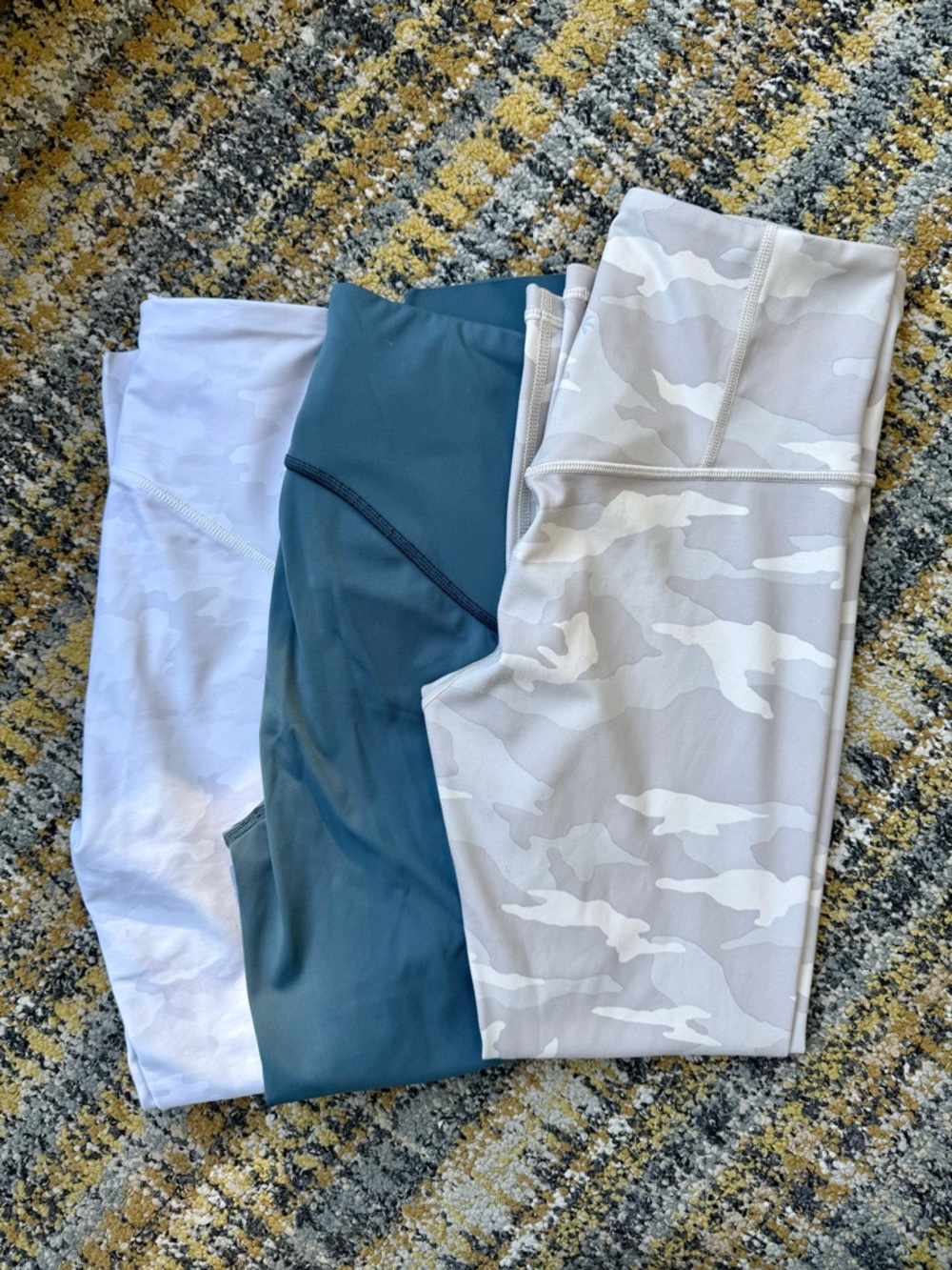 2 SPANX and 1 Athleta 3-Pack women's leggings: White Camo, Teal, Light Gray Camo